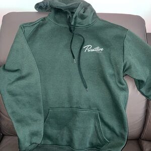 Green primitive sweater